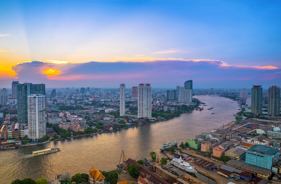 Landscape of river in Bangkok cityscape with sunset © CasanoWa Stutio