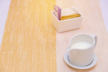 milk in jug for hot coffee or healthy drinks