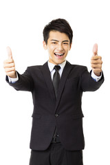Fototapeta na wymiar young business man with thumbs up gesture