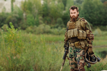 Fototapeta premium portrait of the special forces ranger on battlefield