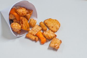 small season cake made of flour boiled in coconut milk