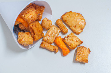 small season cake made of flour boiled in coconut milk