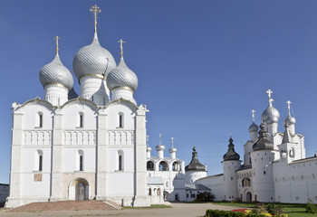 Fototapeta na wymiar Assumption Cathedral with belfry, Holy Gates and the Resurrection Church with belfry on the cathedral Square of the Kremlin of the Rostov Veliky