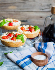 sand tarts with goat cheese and cherry tomatoes, vegetarian food