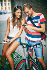 Fototapeta na wymiar Couple on bicycles