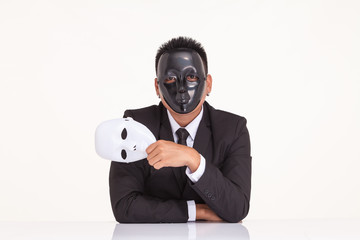 insincere espionage businessman swap the fancy mask. White backg