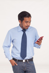 Asian young businessman talk cellphone