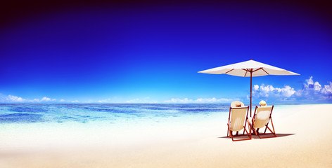 Couple Relaxing Tropical Beach Ocean Summer Travel Concept