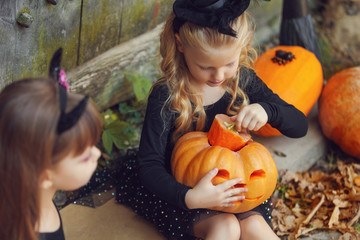 Happy group witch children during Halloween party