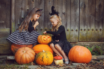 Happy group witch children during Halloween party