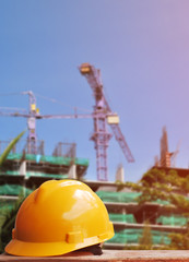 Safety helmet with construction site background