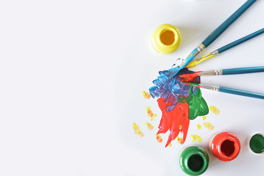 watercolors and brushes