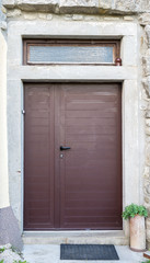 Obraz na płótnie Canvas double-wing front door brown