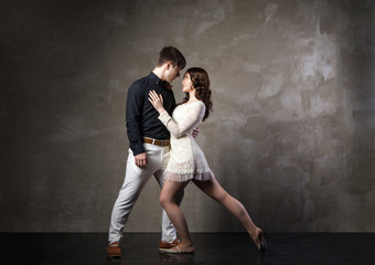 Beautiful couple in the active ballroom dance