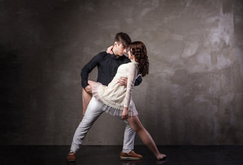 Beautiful couple in the active ballroom dance
