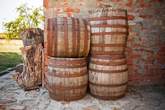 Stacked wooden barrels.