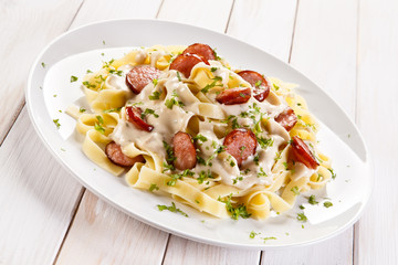Pasta with sausages and vegetables 