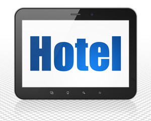 Tourism concept: Tablet Pc Computer with Hotel on display
