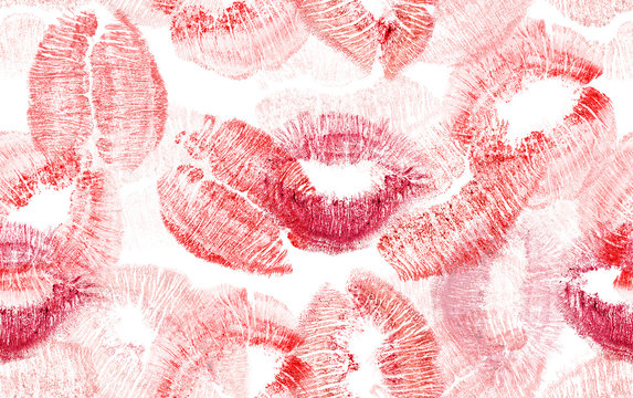 seamless background with red lips imprints on white