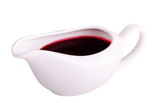 berry sauce in a gravy boat