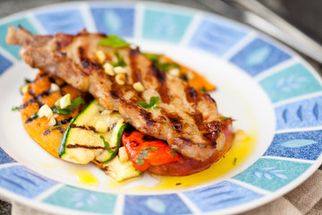 Grilled meat and vegetables.