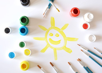 watercolors and brushes