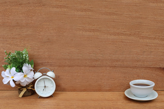 Clock And Cup Of Tea