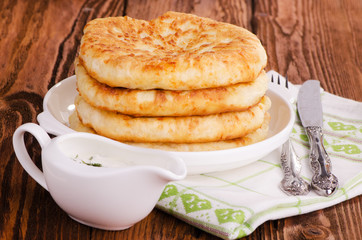 fried cheese cakes with sour cream sauce