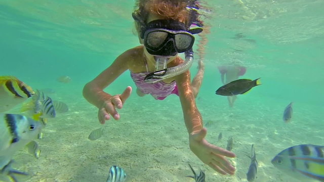 Girl snorkelling underwater