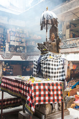 The spirit house inside market in Ubud, Bali.