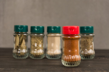 Spices and herbs in  bowls.