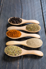 Spices and herbs in  bowls.
