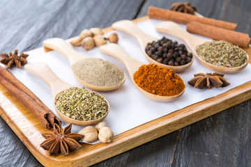Spices and herbs in  bowls.
