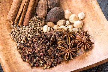 Spices and herbs in  bowls.