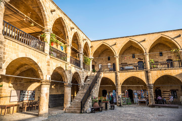 NICOSIA, CYPRUS - AUGUST 10, 2015: Buyuk Han (The Great Inn) a touristic center with an antique...