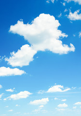 The blue sky with clouds, background
