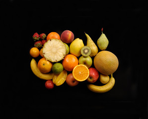 fruits on black background