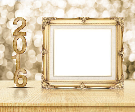 Golden Vintage frame with 2016 year wood texture with sparkling