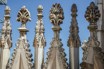 Fototapeta na wymiar Decorations at the roof of Milan cathedral, Duomo di Milano