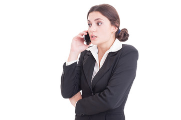 Surprised young business woman having a phone conversation