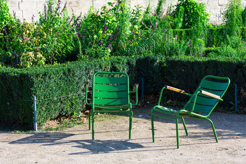 Tuileries Garden and two green garden chairs, Paris, France