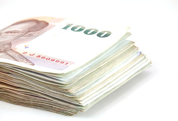 1000 Thai banknote on white background. Close up shot.