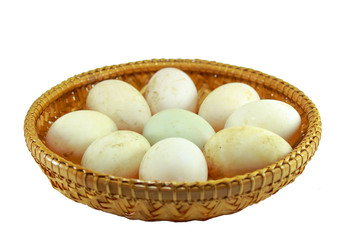  duck eggs in the bamboo bowl basket on white background