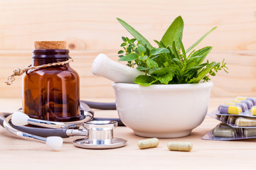 Obraz na płótnie Canvas Capsule of herbal medicine alternative healthy care with stethos