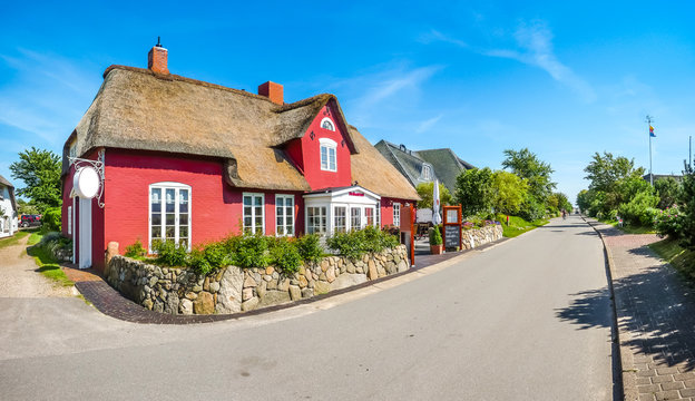 Beautiful and traditional thatched house in german north sea village