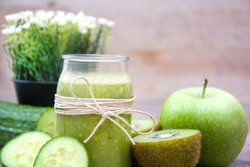 Green smoothie with cucumber,kiwi and apples