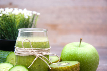 Green smoothie with cucumber,kiwi and apples