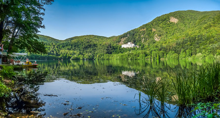 Monticchio Lake with famous Abbey and Monte Vulture, Basilicata, Italy