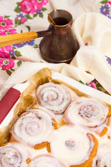 Delicious cinnamon rolls in baking tray