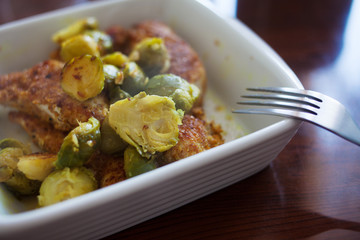 homemade food. Meat steamed with cauliflower and broccoli, top